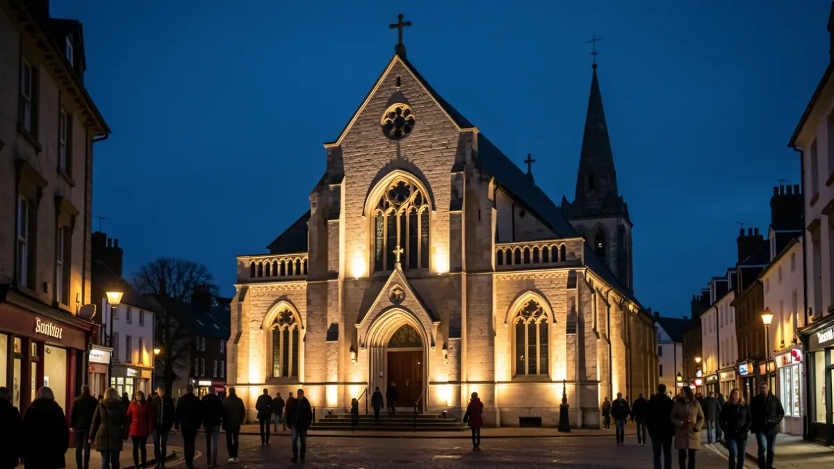 Generic image of a church facade illuminated at dusk with architectural lighting.